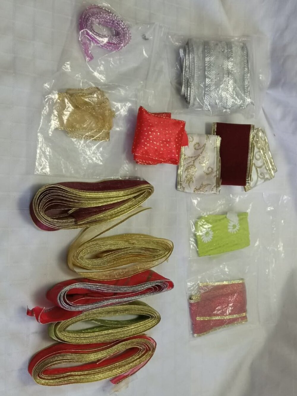 Yards of ribbons with integrated wire in various patterns, widths & lenghts